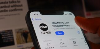 Close-up of a smartphone displaying the ABC News app