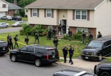 Trump House ATTACK: Veteran Dead, Questions Loom…. Law enforcement officers conducting a raid in a residential neighborhood