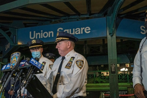 shutterstock_2063810501-1- Police officers giving a statement at Union Square station.