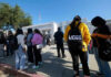 Nine Overdoses, No Alerts—Fury Erupts Students standing outside a high school entrance