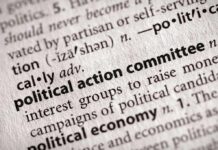 Smithsonian Neutrality War Explodes Close-up of a dictionary entry for political action committee